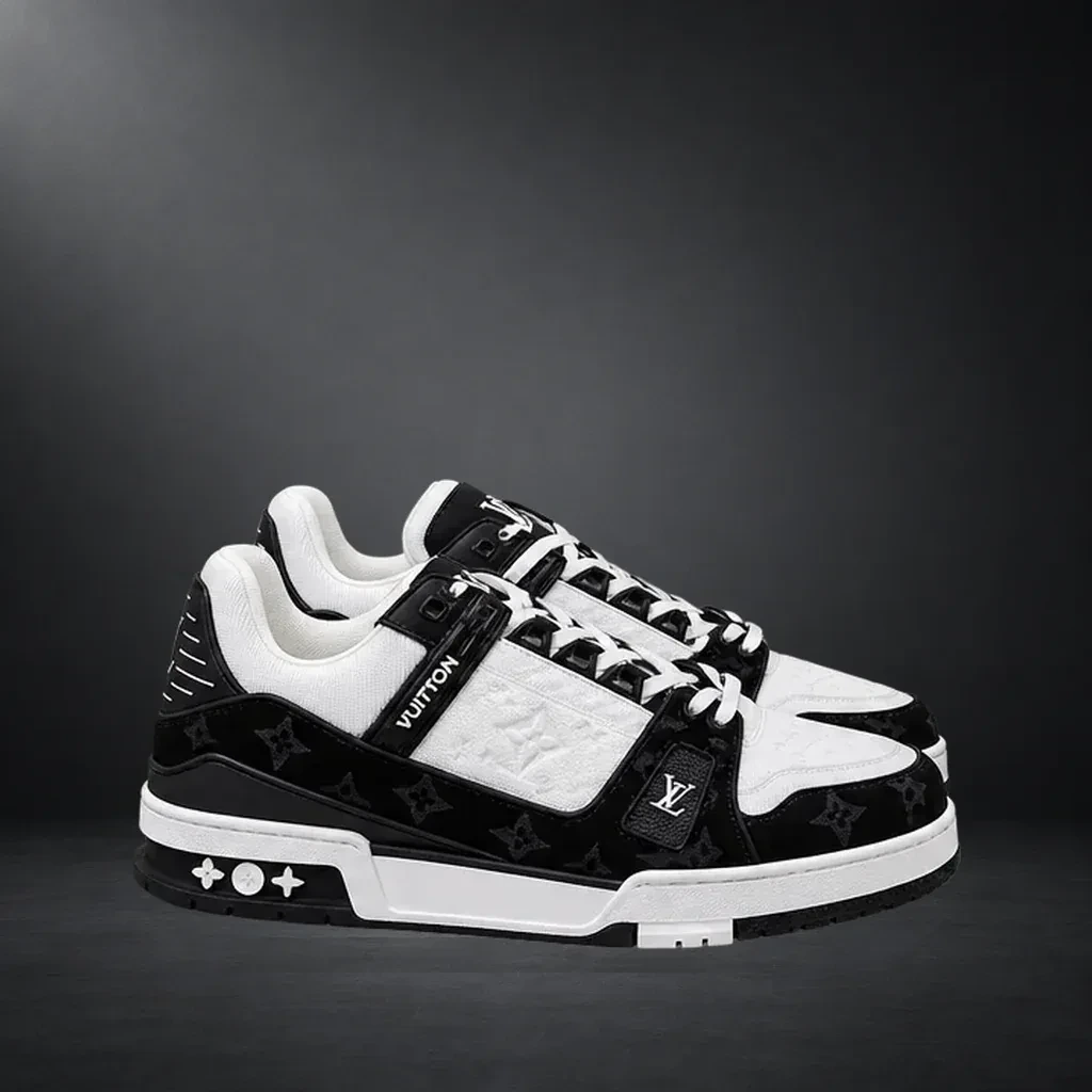 LV Trainer blanco y negro, vista principal sobre fondo carbón